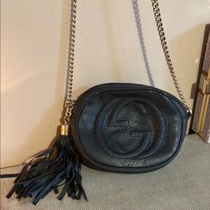Gucci Black and Gold Crossbody Bag with Iconic GG Logo